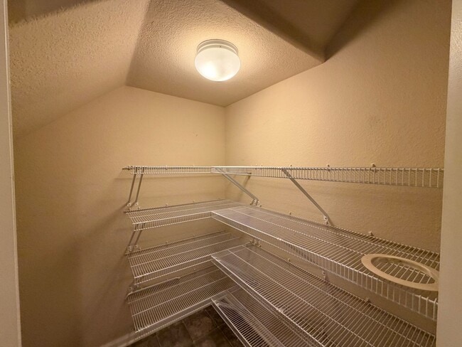 Photo - Bright Open-Concept Condo with 1-Car Garage in Prime Commuter Location