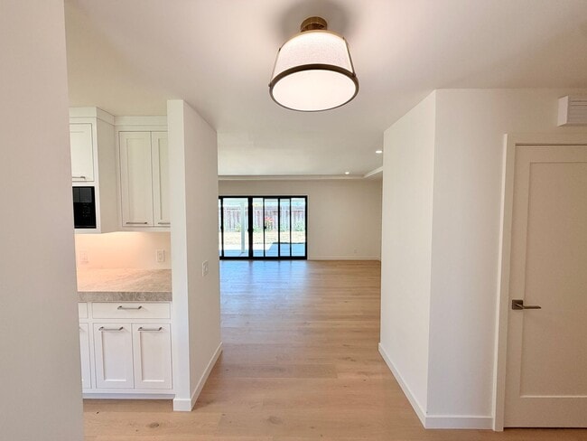 Photo - This premier 4-bed, 3-bath estate spans 2,565 sq. ft. on a 10,253 sq. ft. lot in North Los Altos.