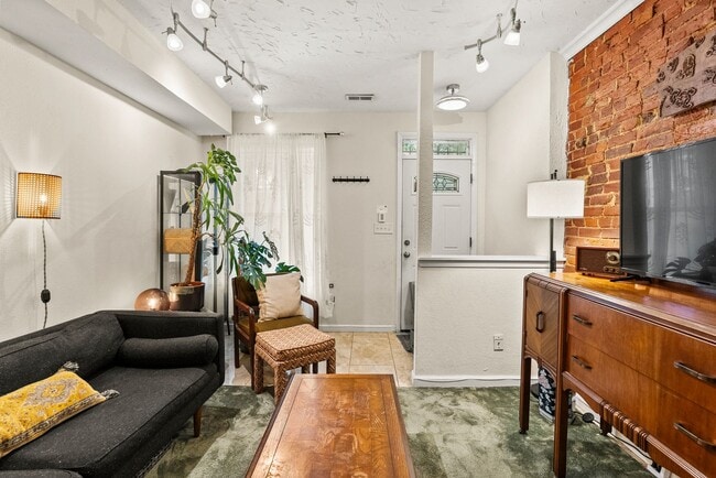 Photo - Charming Row Home | 2 Bed | 1 Bath | 950 Sf | Fenced Backyard | 2 Surface Parking Spaces