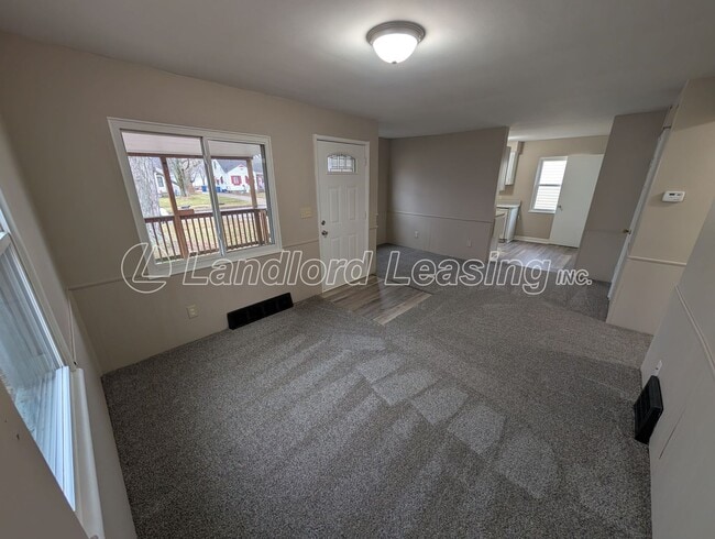 Photo - Updated Cape Cod with New Flooring, Front Deck & Garage