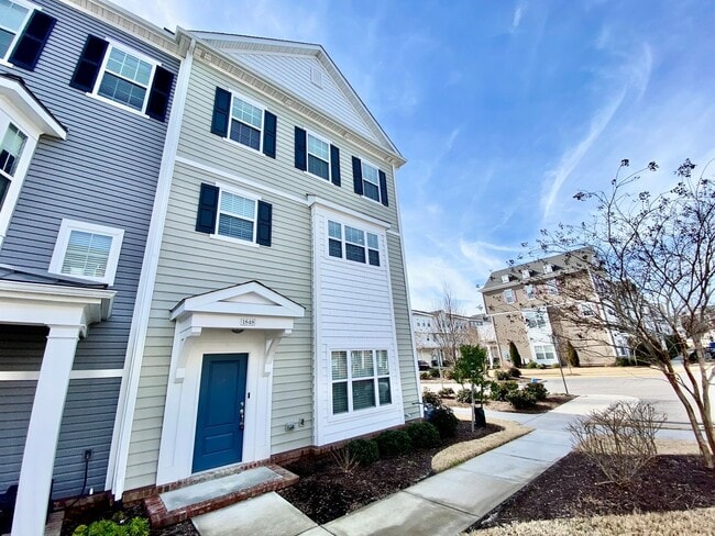 Building Photo - 3 Bedroom Townhome in Spence Crossing! Water/Sewer/Trash/Landscaping INCLUDED! - Attached Garage ...
