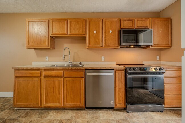 Photo - Spacious 4BR/3BA Townhome | Pet Friendly | Washer & Dryer Included | $1,600/mo