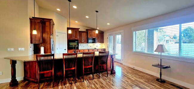 Photo - THREE-CAR GARAGE! This charming home offers 3 bedrooms, plus an office/rec room, and 2 bathrooms.