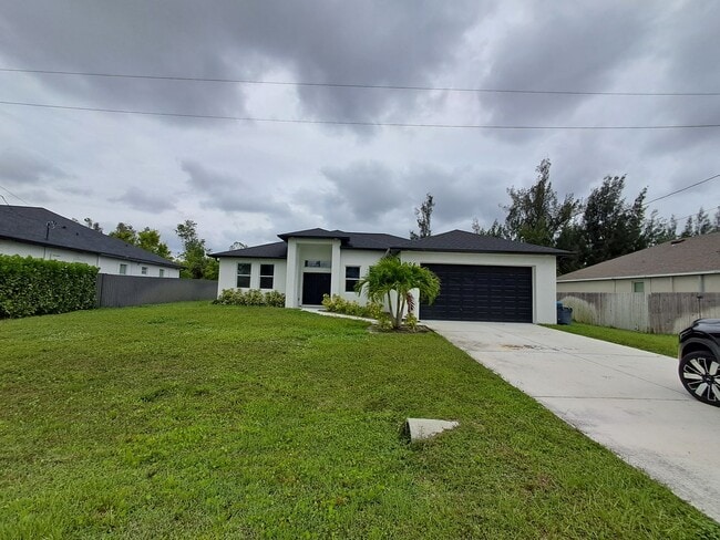 Building Photo - FIRST MONTH FREE!!! 4/2 In NW Cape
