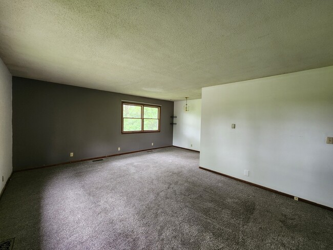 Family room/Dining area - 6141 S State Rd 63 Apartments Unit B