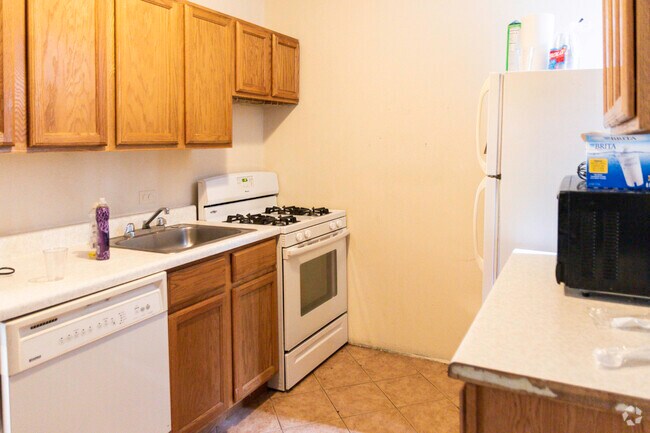 Building Photo - 1101 W Barry Ave Unit E1 Rental