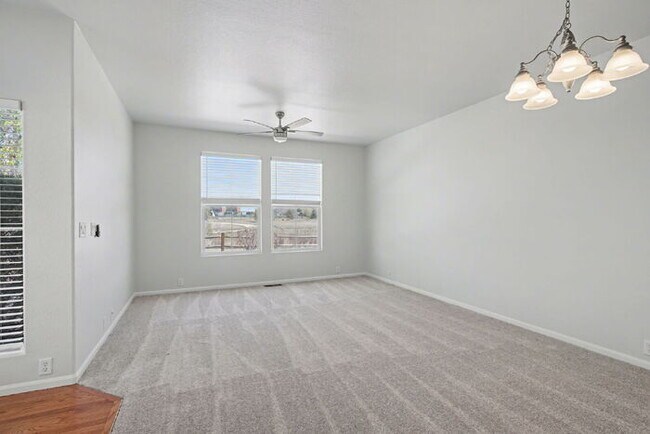 Photo - Beautifully Updated 3-Bedroom End-Unit Townhome Facing Open Space with Attached 2-Car Garage in G...