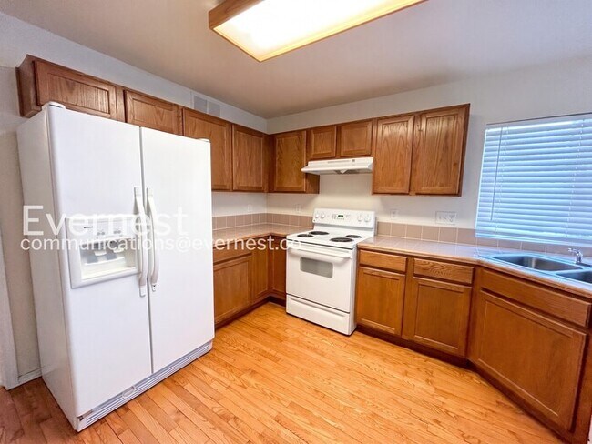 Photo - 3 Bed, 2.5 Bath Home with Fenced Yard & Garage / Available Soon!