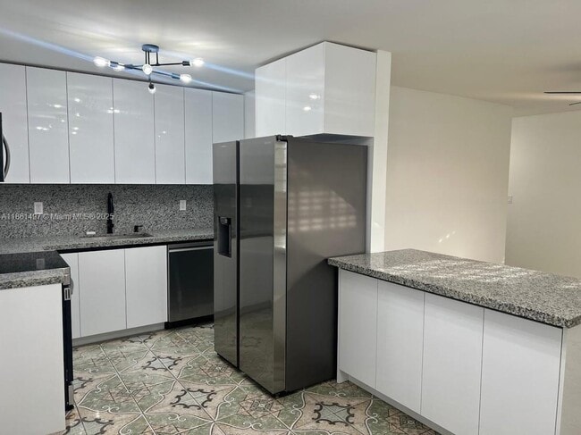 Building Photo - 3081 NW 94th St Unit 3083 Rental