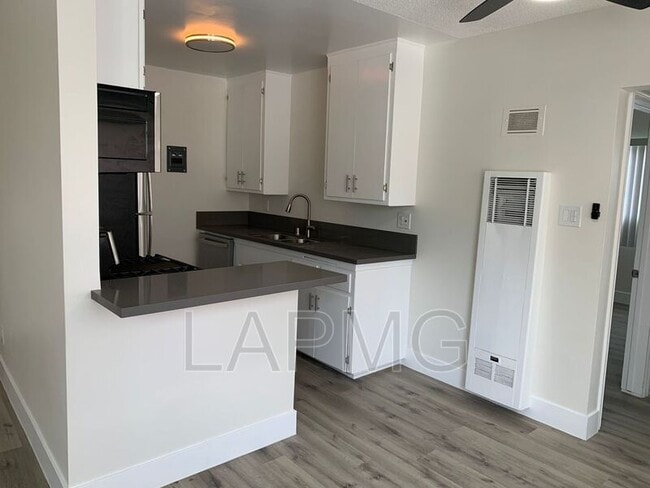 Building Photo - 10919 Pioneer Blvd