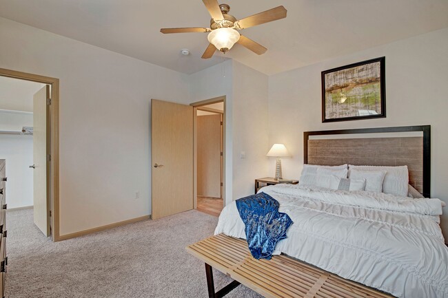 Master Bedroom with Walk-In-Closet - Swan Creek Apartments
