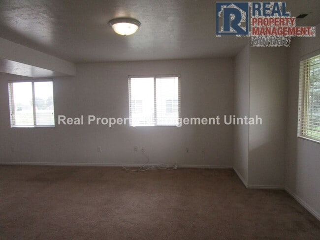 Photo - Real Property Management Uintah is currently renting this 3 bed, 1.5 bath twin home available in ...