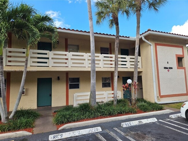 Building Photo - 3272 NW 102nd Terrace Unit 104-E