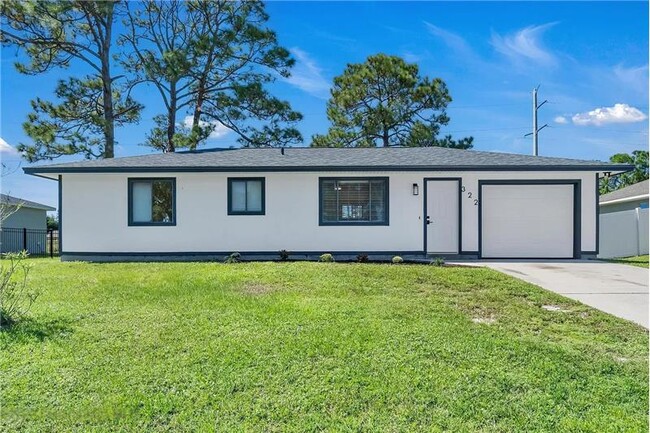 Building Photo - 322 Ixora Ave NW