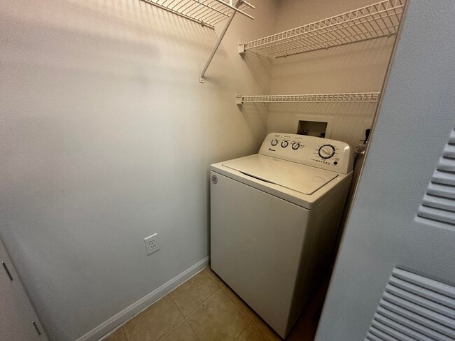 Building Photo - 3615 NW Mediterranean Ln Unit 13-205