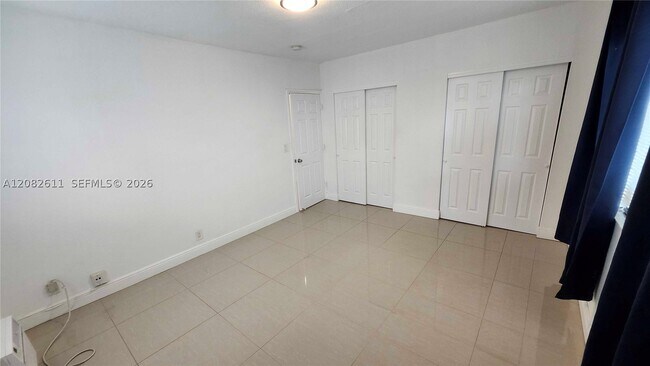Building Photo - 9770 E Bay Harbor Dr Unit 6S