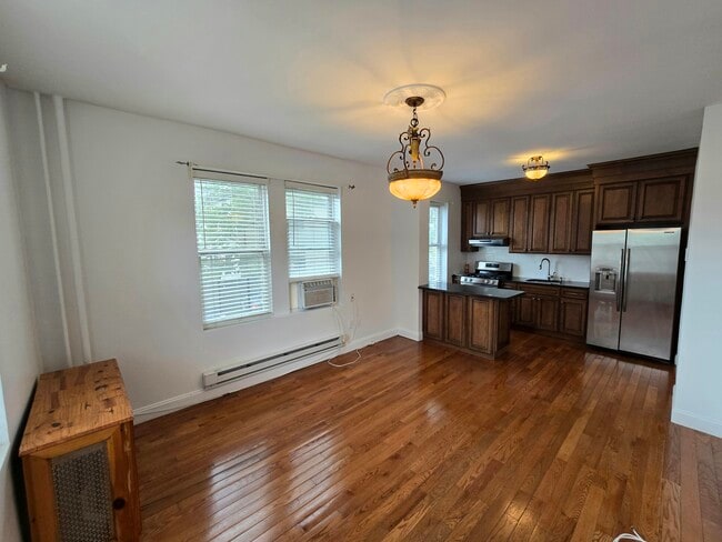 Building Photo - 7505 Palisade Ave Unit A4