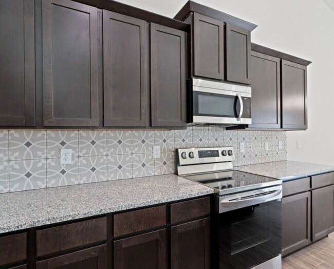 Photo - Brand New Townhome, offering $400.00 off the first months rent for units with a signed lease star...