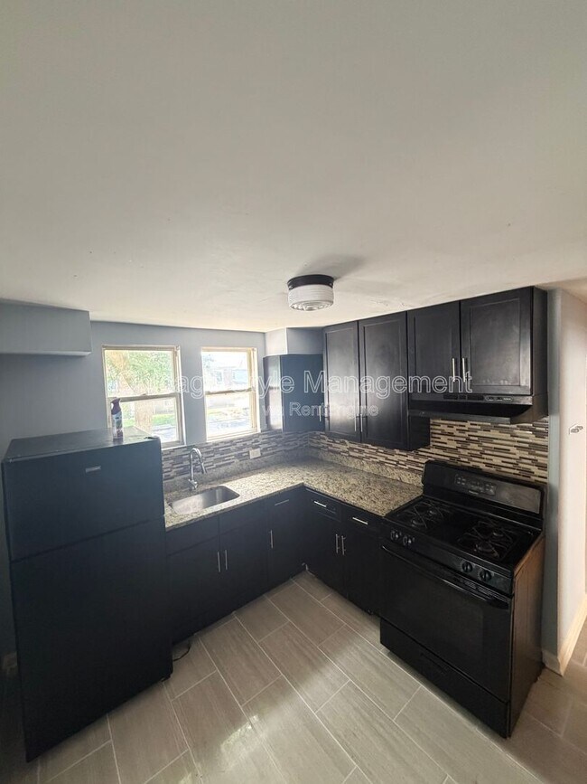 8756 S Exchange Ave Unit 1f