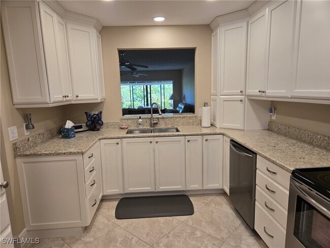 Building Photo - 15400 Cedarwood Ln Unit 102