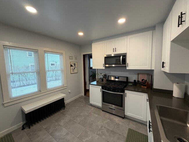 Kitchen Toward Dining Area Area - 1819 4th St NE Unit 1