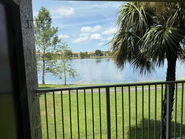Building Photo - 5061 Wiles Rd Unit 202 Rental