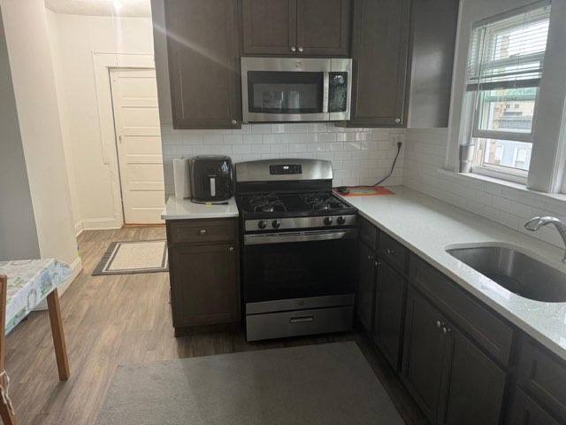 Building Photo - 647 Anderson Ave Unit 3 rear