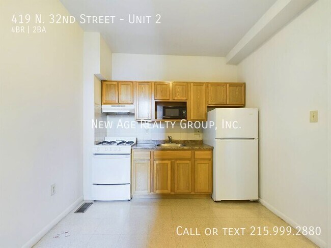 Photo - Spacious, Bi-level Apartment Available at ... Unit 2