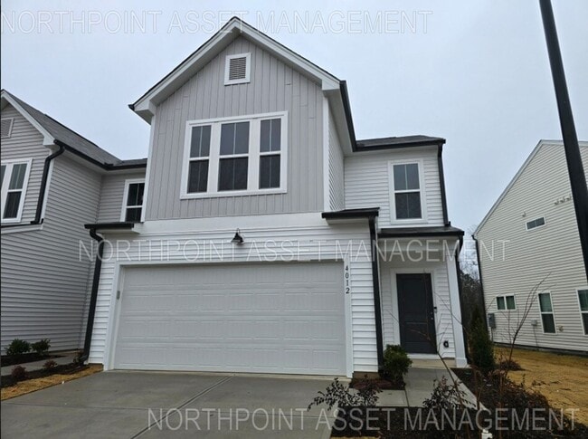 Building Photo - NEWLY BUILT END UNIT TOWNHOME
