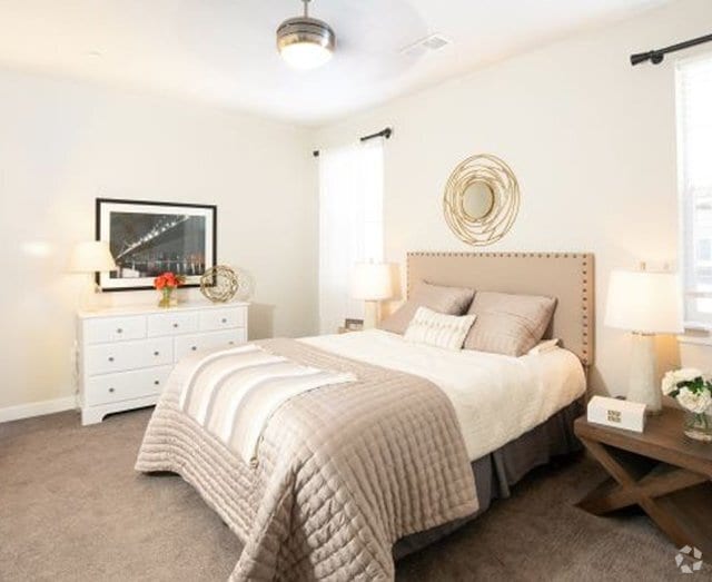 Comfortable Bedroom - Parc on Center Apartments & Townhomes