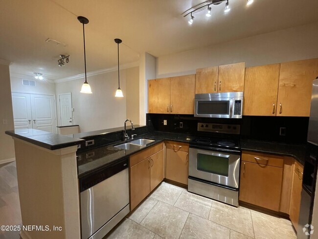Building Photo - 8290 Gate Pkwy W Unit 1009 Rental