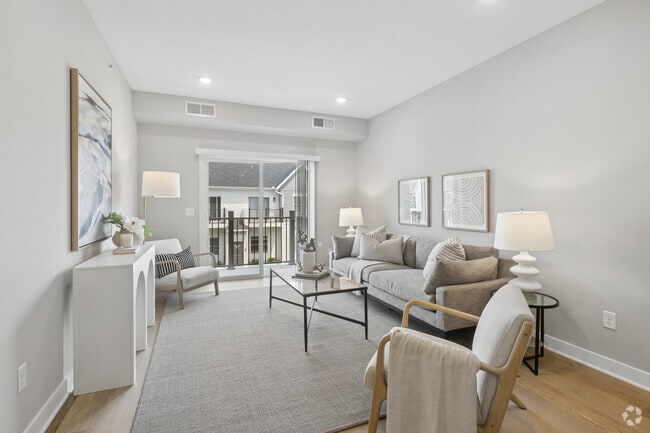 3BR, 2BA - 1,450SF - Living Room - Oneka Fields Townhomes
