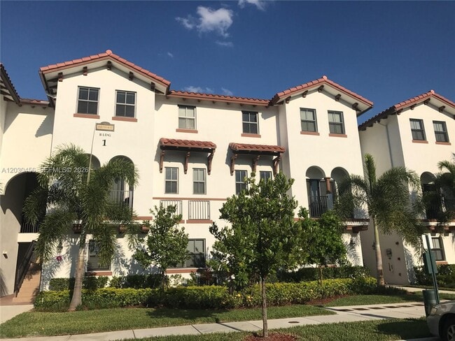 Building Photo - 10620 NW 88th St Unit 216