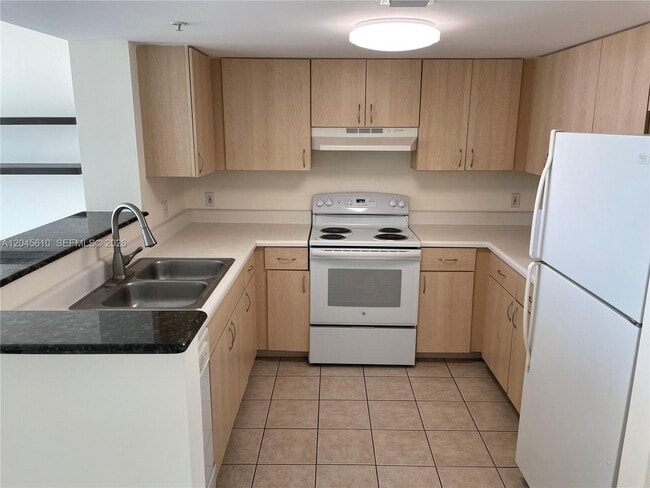 Building Photo - 3000 Coral Wy Unit 1402