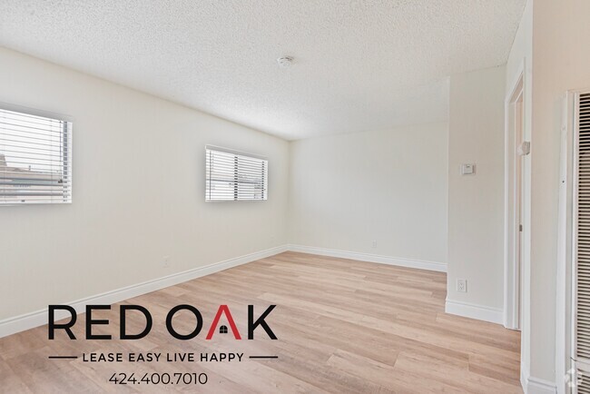 Building Photo - 706 McDonald Ave Unit 205 Rental