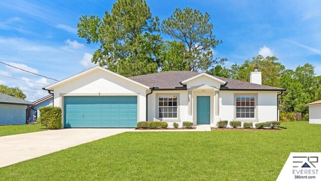 Building Photo - FULLY FENCED 3/2/2 IN THE HEART OF PALM COAST