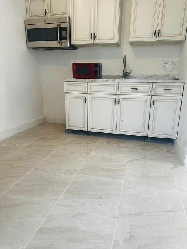 Photo - 100 NW 1st Ave