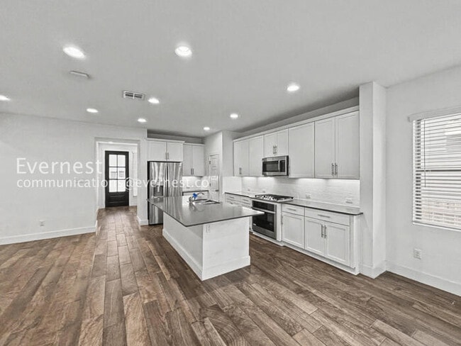 Photo - 3 Bed, 2 Bath Home with Fenced Yard & Garage / Pet-Friendly / Available Now!