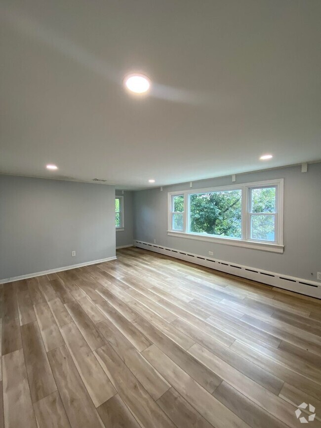 Building Photo - Modern 1 bedroom apartment with garage par... Unit Apt A