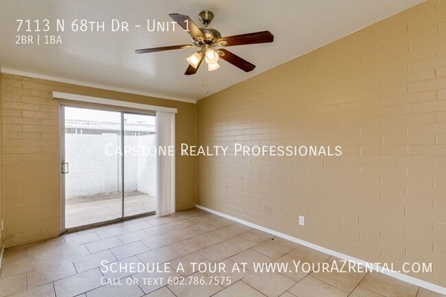 Building Photo - 7113 N 68th Dr Unit 1