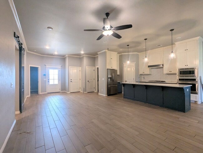 Photo - Beautiful Edmond Home | Gas Fireplace, Storm Shelter & Fenced Backyard!