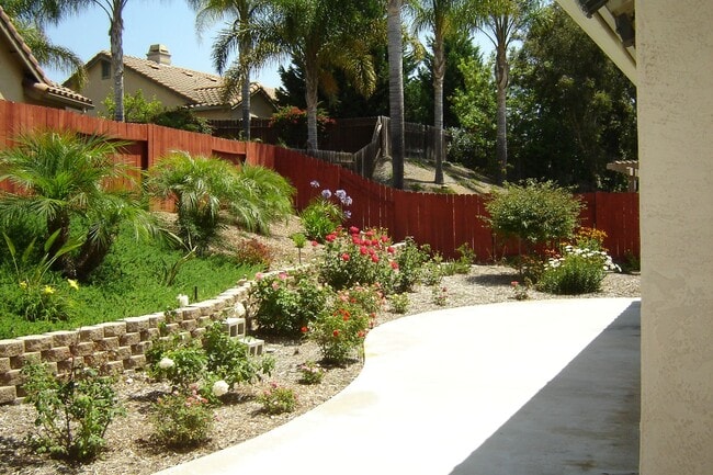 Photo - Spacious single-level home located on a quiet corner lot in a well-established Oceanside neighbor...