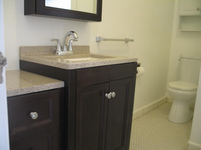 Bathrooms have a tub with shower