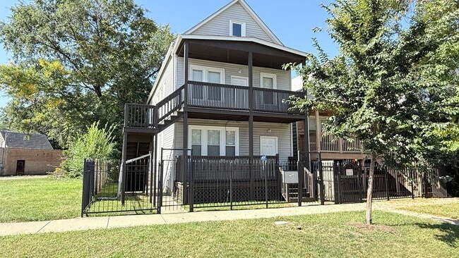 Building Photo - 8438 S Baltimore Ave Unit 1R Rental