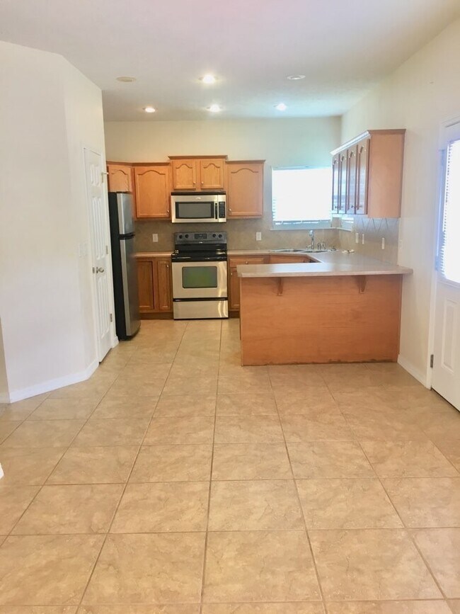 Photo - Beautiful Home In A Peaceful Residential Neighborhood