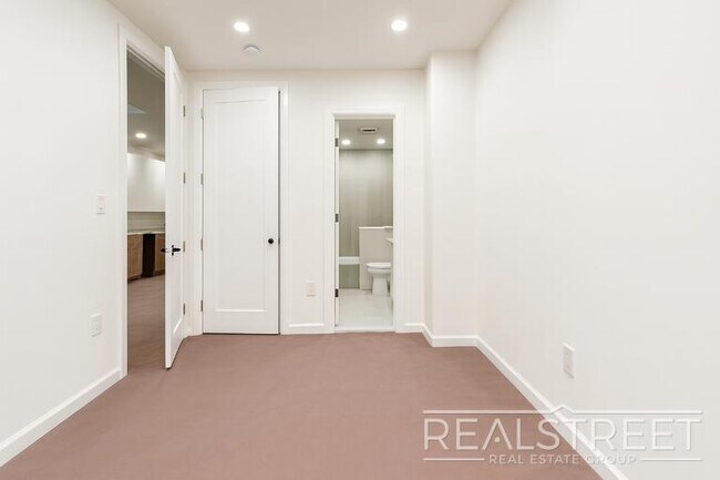 Photo - Spacious 2-Bedroom, 2-Bath Apartment in Bed-Stuy with Modern Amenities