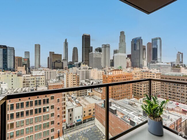 Balcony view of the city at Sentral DTLA. - Sentral DTLA Rental