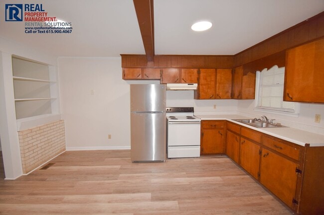 Photo - 2 bedroom 1 bath duplex with washer/dryer hookups, lawncare included!