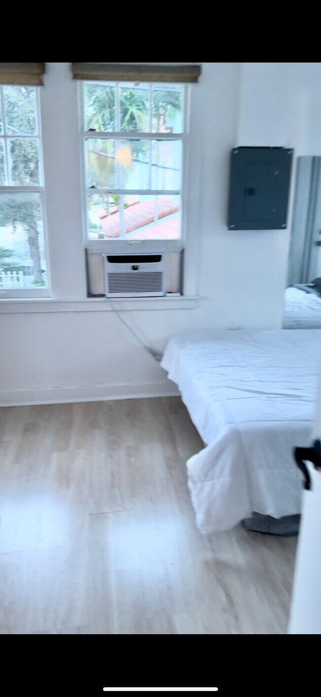 Bedroom if you turn right there’s the door to the back porch - 1302 S N St Unit UGL apt 2