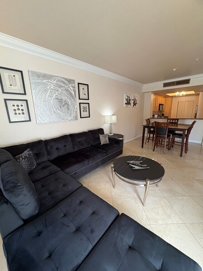 Photo - Long or short term available!  Live in luxury in this fully furnished 2 bedroom condo.